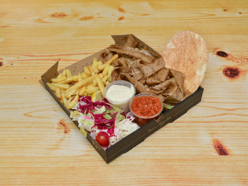 Sizzling doner kebabs with chips, sauce, salad and bread served at 
Chick Pizz North Tyneside 